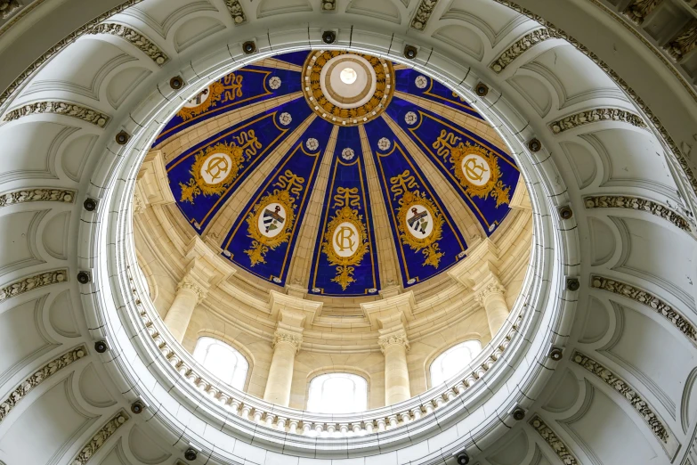 the dome of a very old building with high ceilings