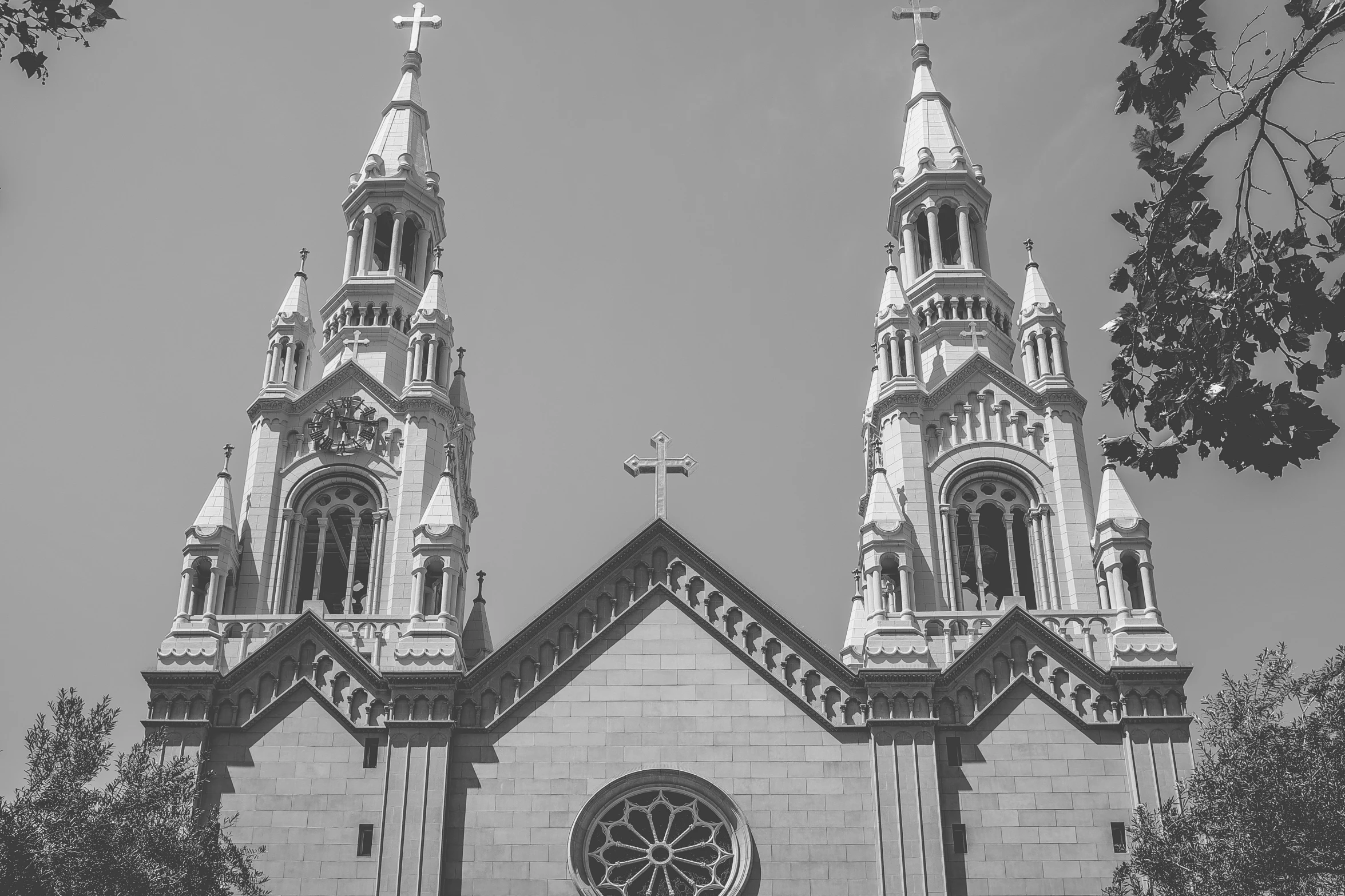a black and white po of a building with steeples