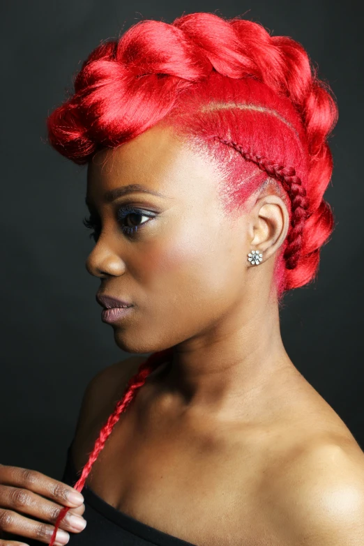 an image of an african american woman with bright red hair