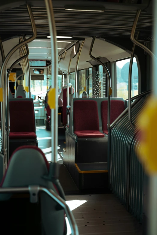 seats on a bus with people sitting