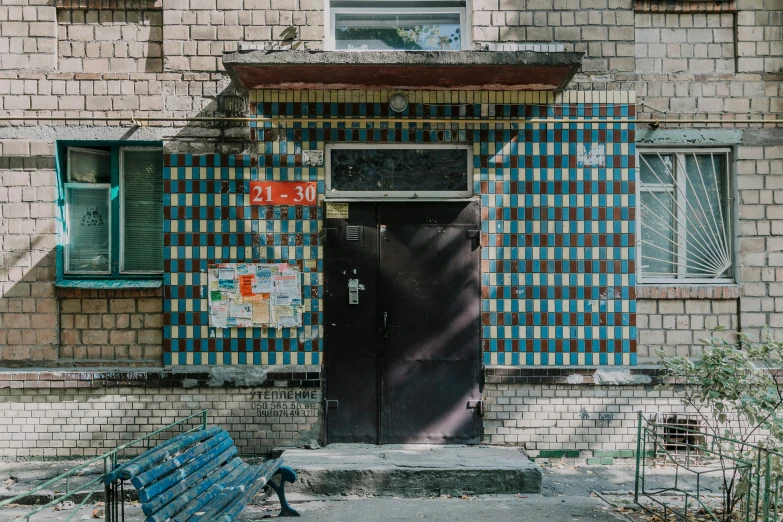 the door is open to an apartment building