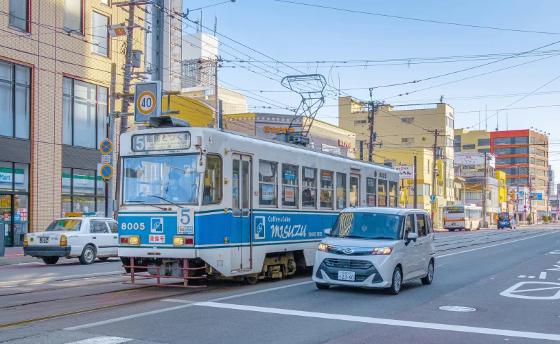 the street car has stopped at the red light