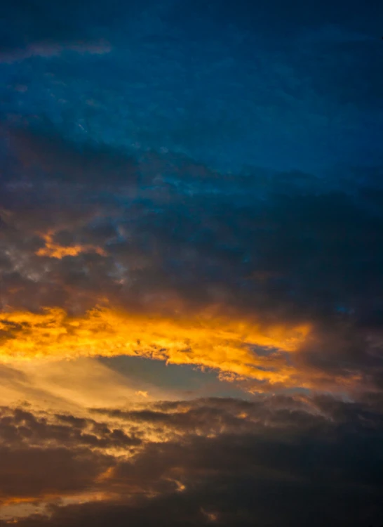 a plane in flight at dusk time