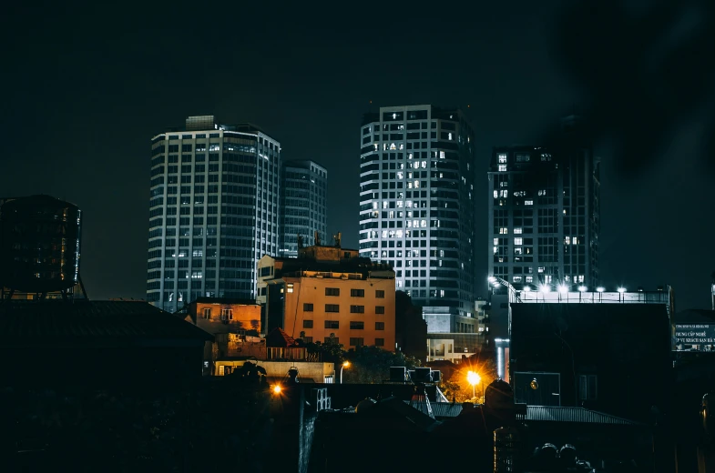 a picture of city buildings at night