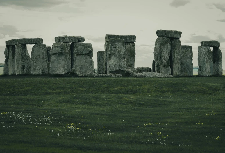 stonehenge at stonehenge park near a grass field