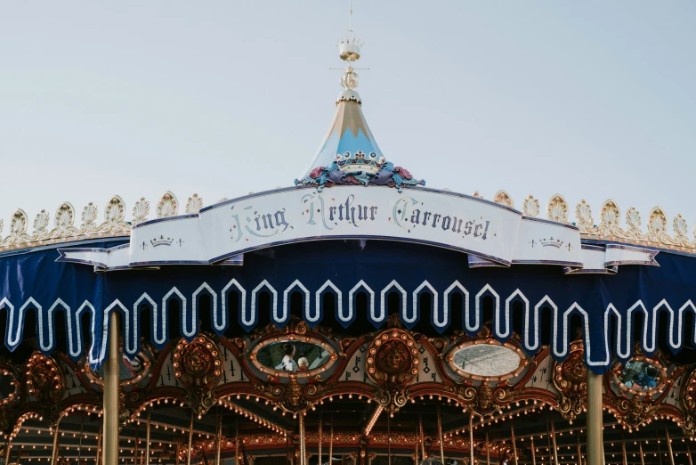 a carousel on a sunny day with lights