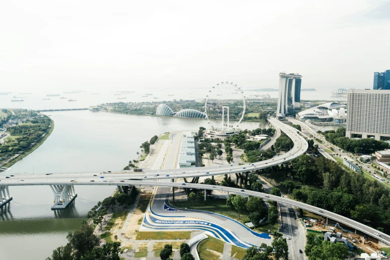 a bridge over water near buildings and a river