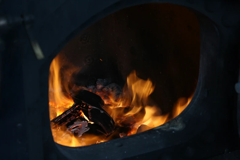 an image of a fire that is burning inside