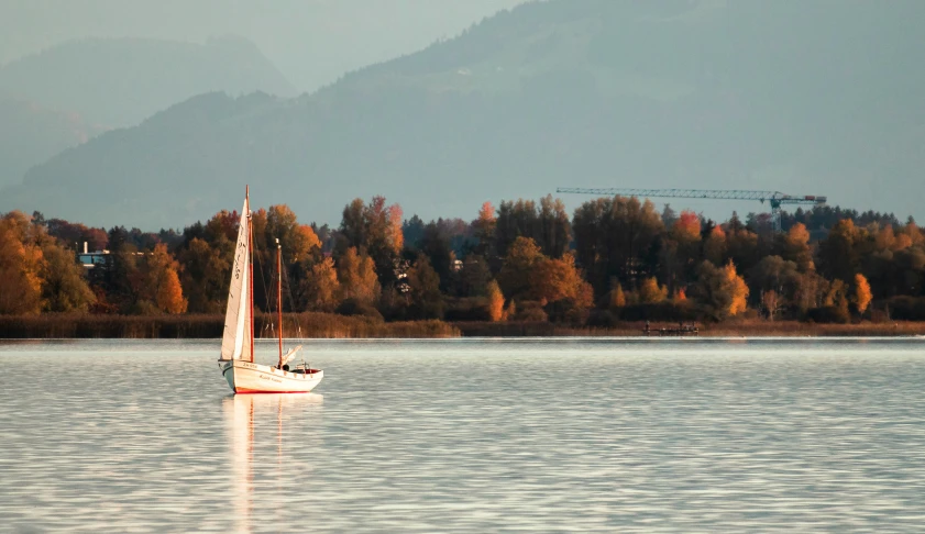 a sailboat in a body of water