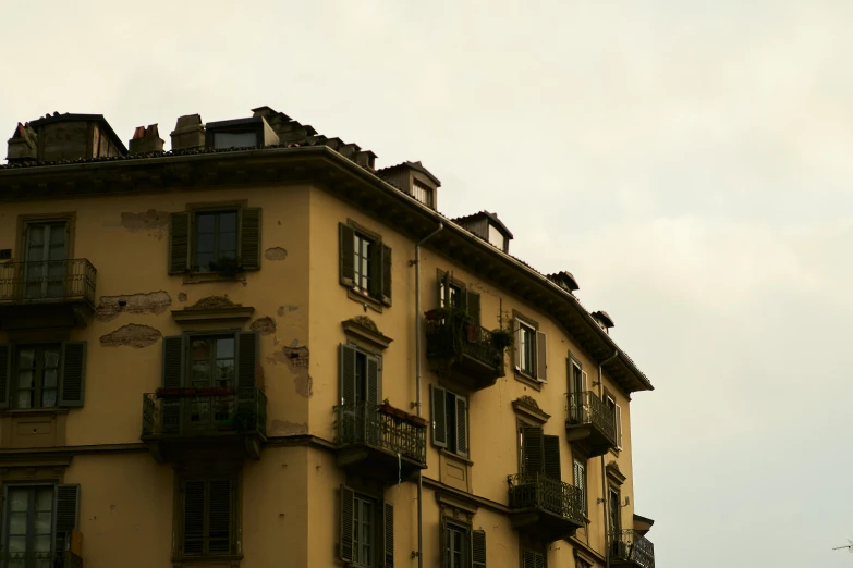 an old apartment building with balconies and balcony