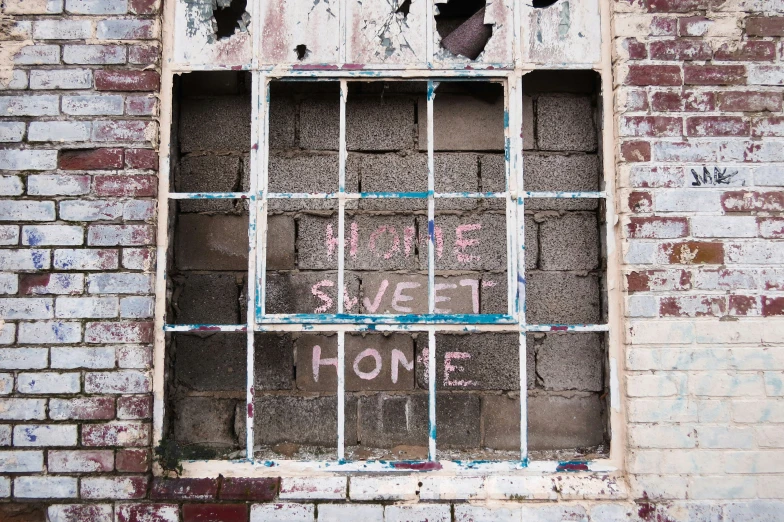 a view of a window and bars on a building