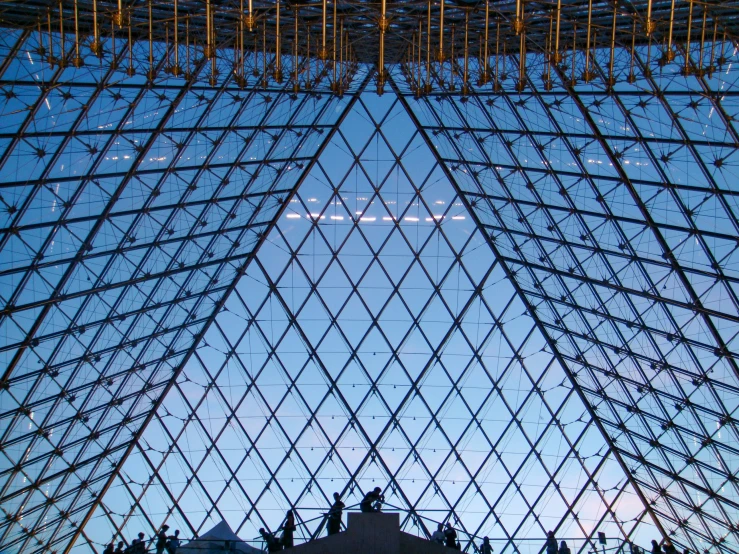 the inside of a very large glass building