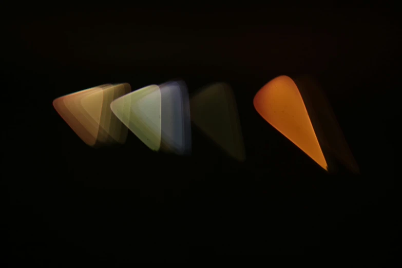 several shapes of different colors with blurry background