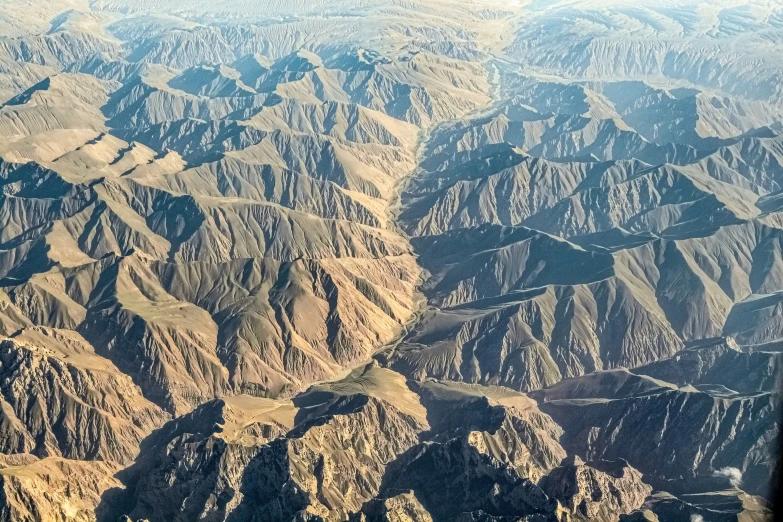 the view from an airplane on a mountain range