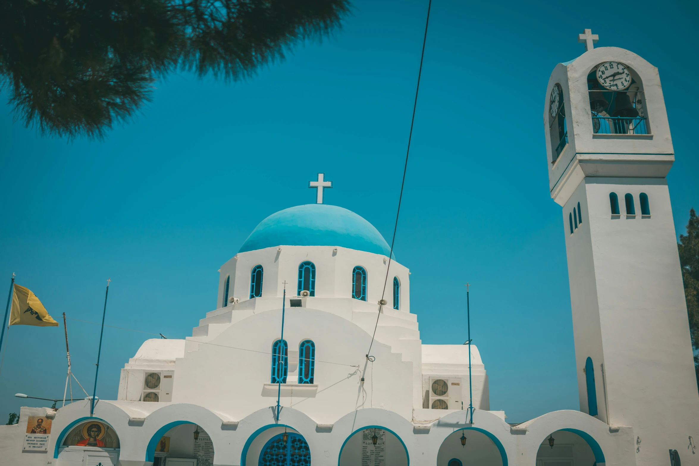 the white building has a blue domed dome