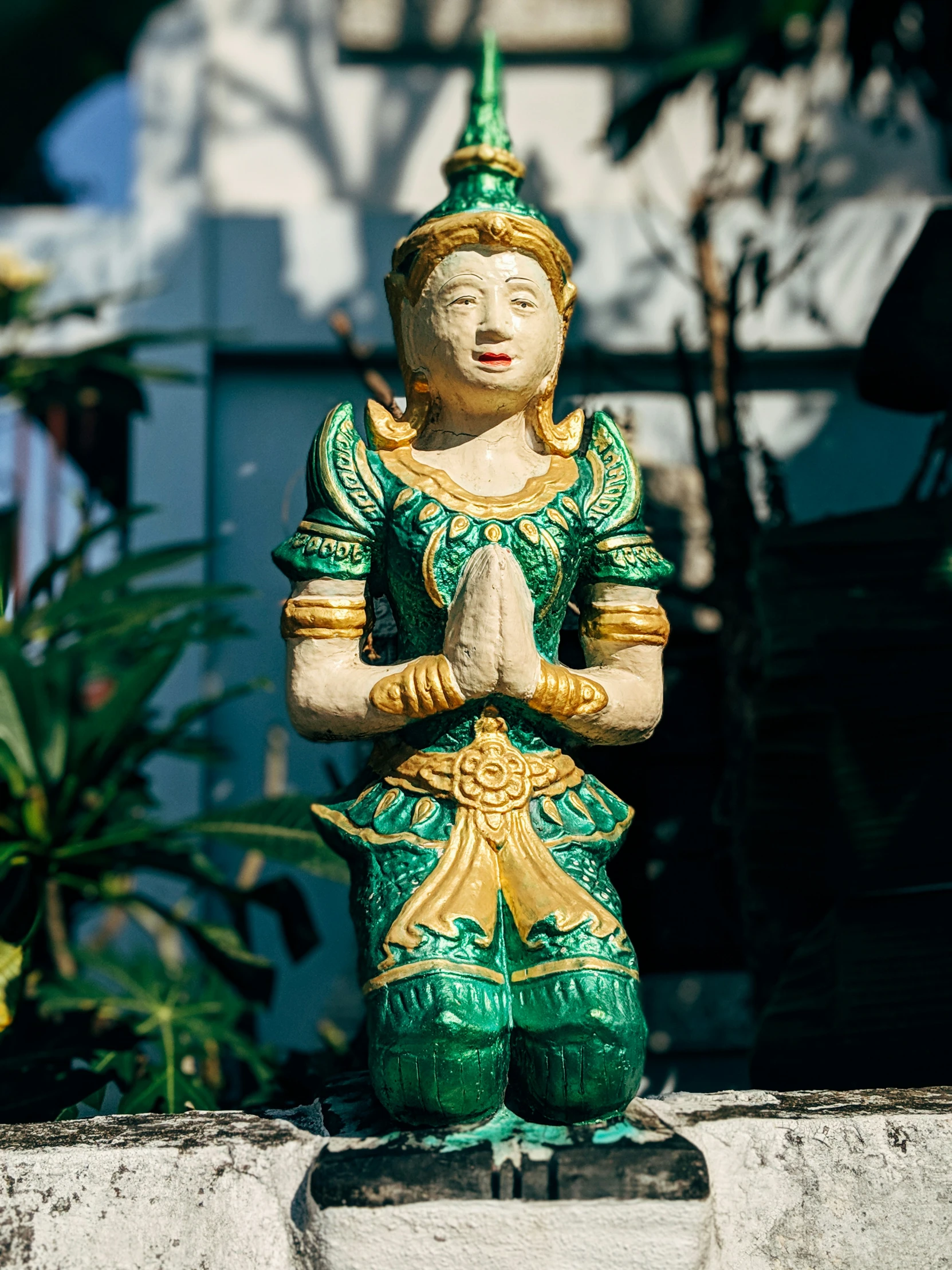 an image of a statue of buddha on the street