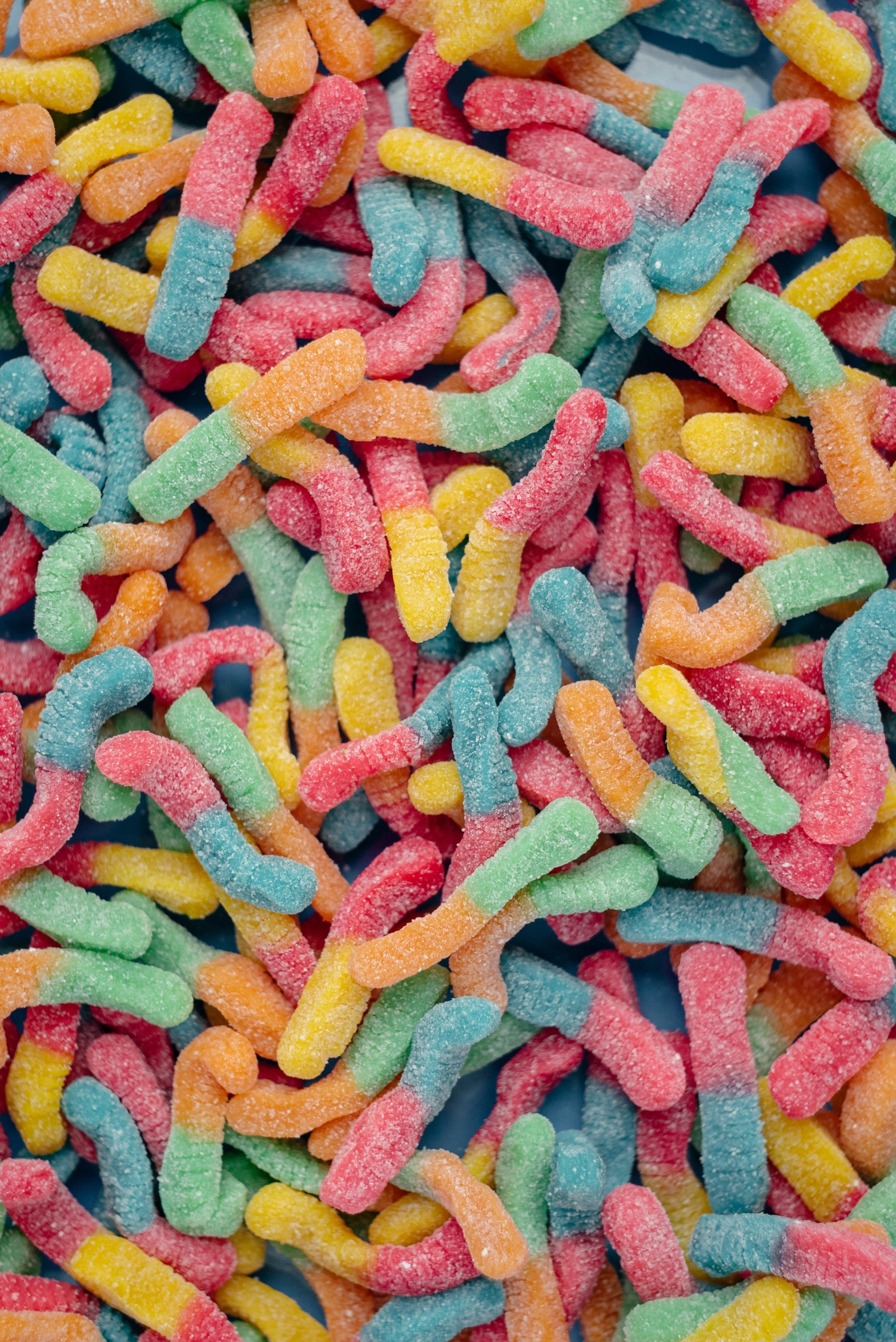 the closeup of several different colored candies