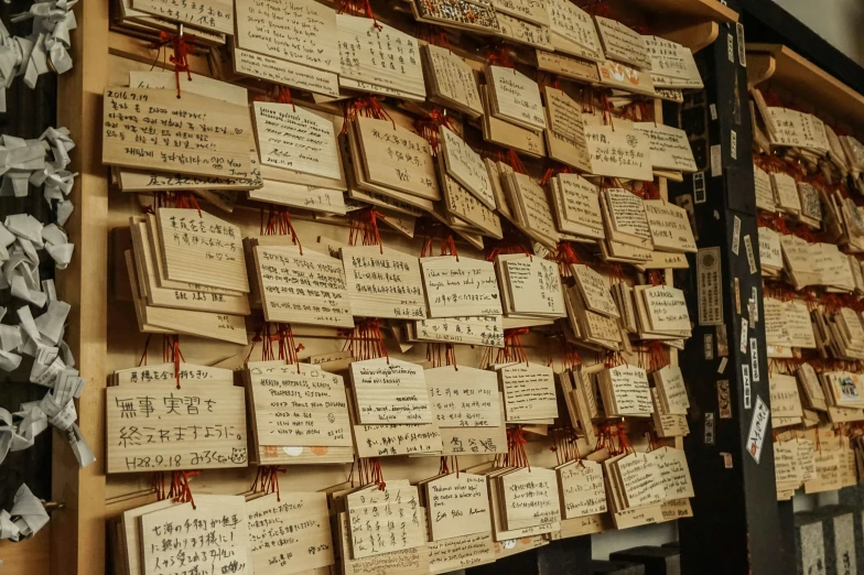 a wall covered in sheet music notes and hanging