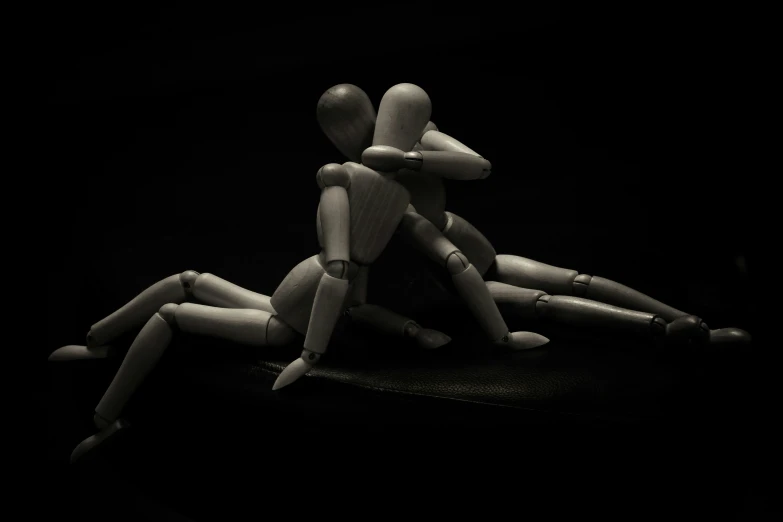the image shows three people on their bodies