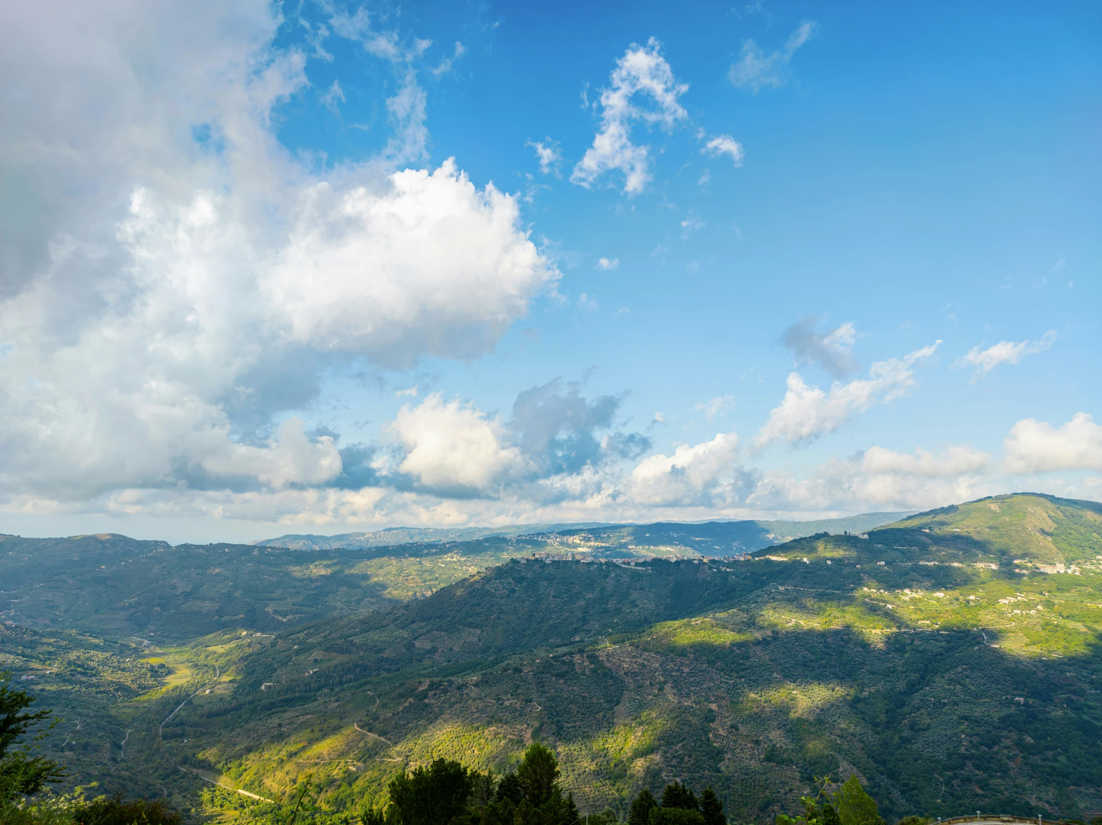 a panoramic view of some hills in the distance