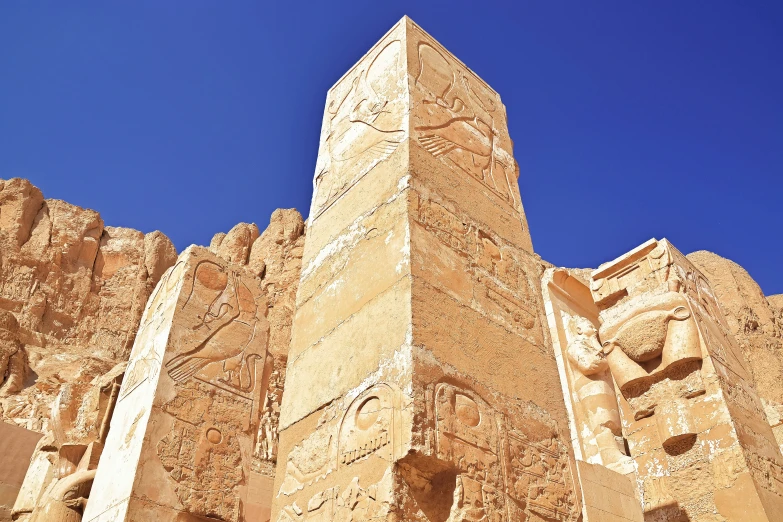 a large stone structure standing on top of a cliff