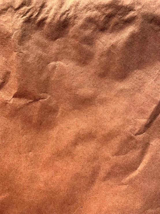 a closeup of some brown sand and grass