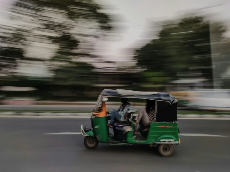 the car has three passengers in it