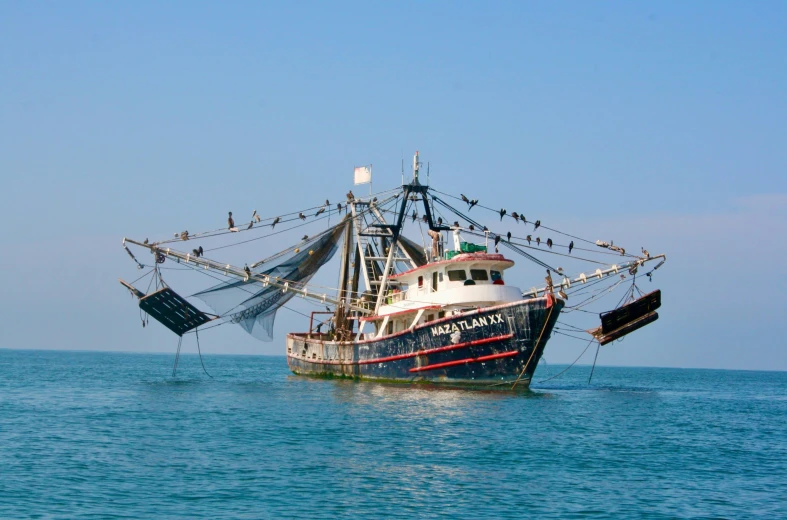 there is a large boat that is floating on the water