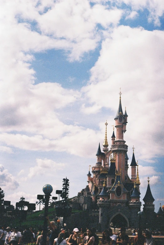 a large castle sitting in the middle of a park