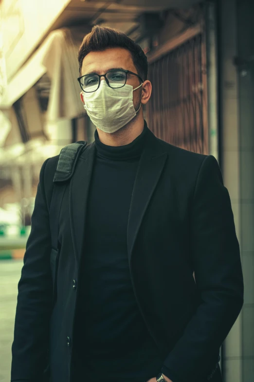 man with a white mask on looking away