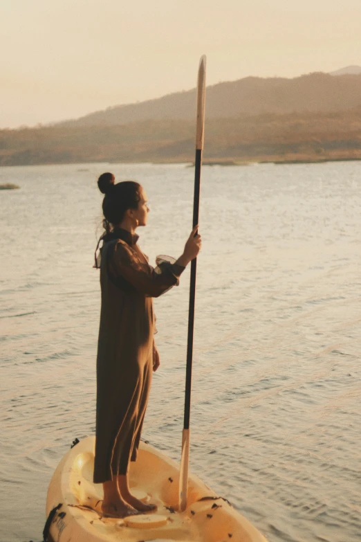 a person is on a kayak in the water