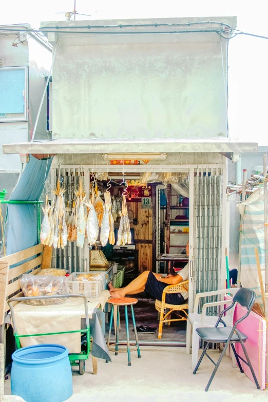 the store has several wooden chairs and various items