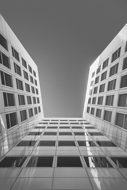 a high building with multiple windows is shown at the top