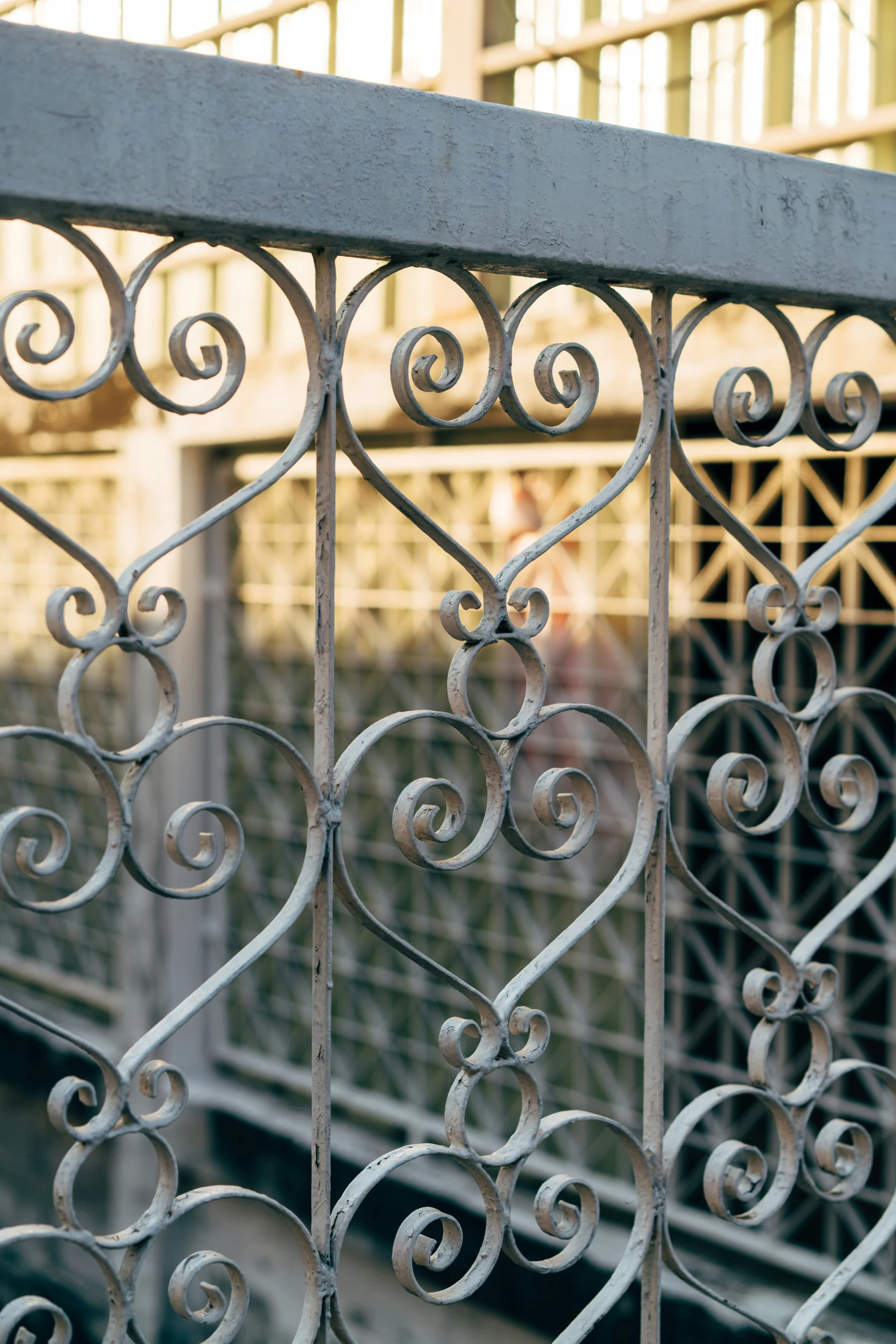 a close up s of a wrought iron fence