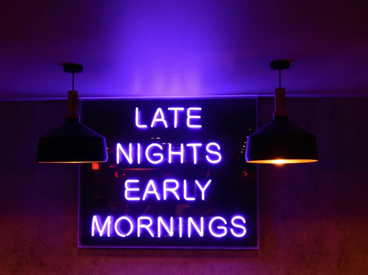 this neon sign is advertising late nights early mornings