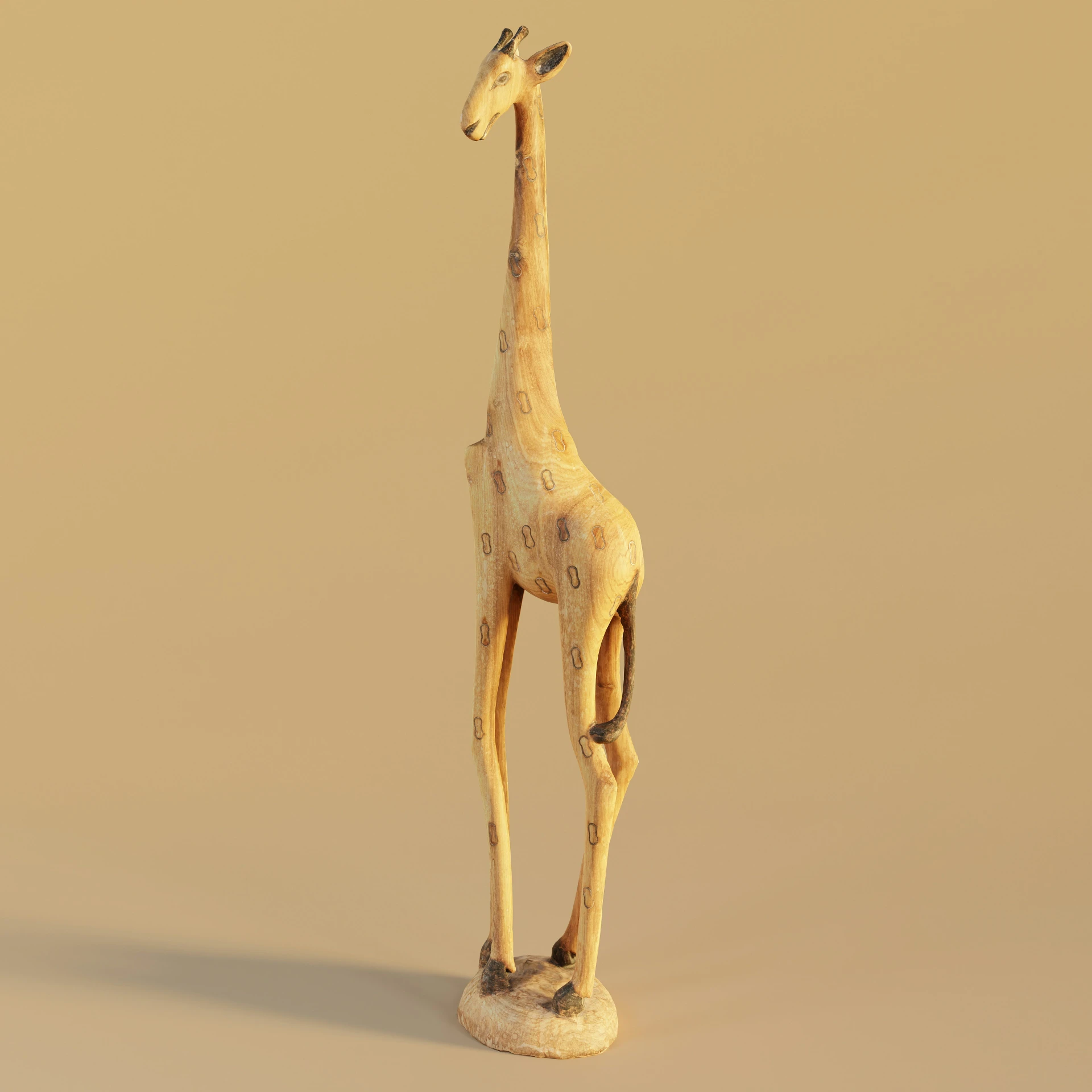 a giraffe statue is standing with its head down