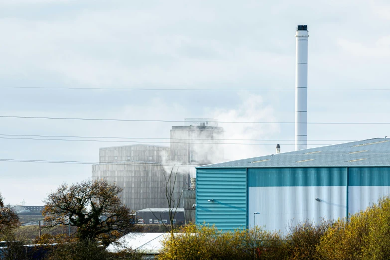 industrial factories and the smokestacks blowing out