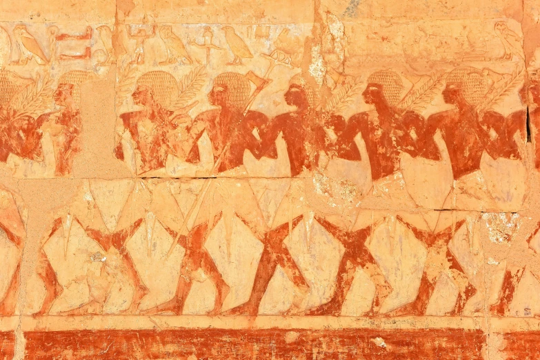 an ancient painting depicting many people