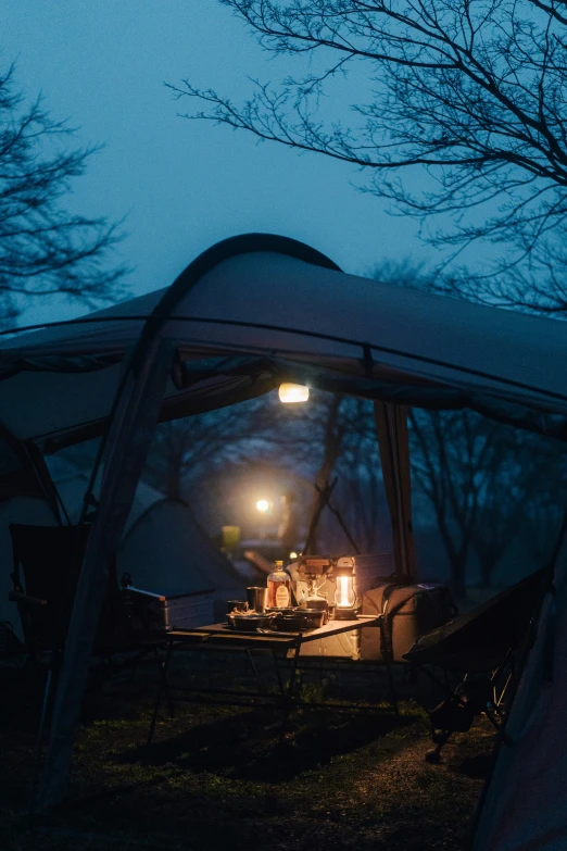 a tent and its reflection in a mirror