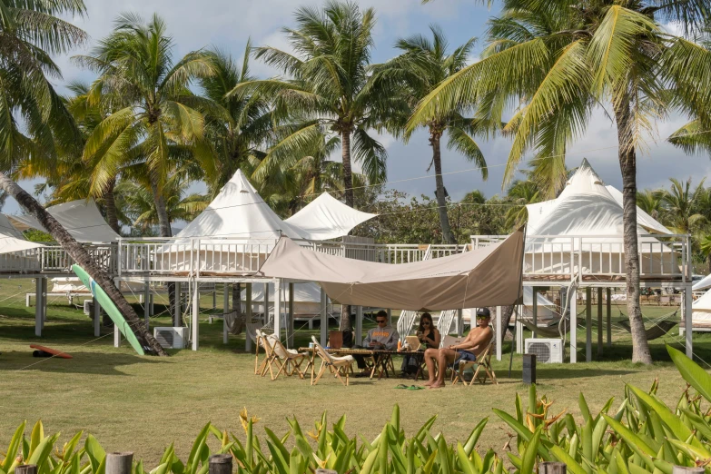 a group of people that are under a tent