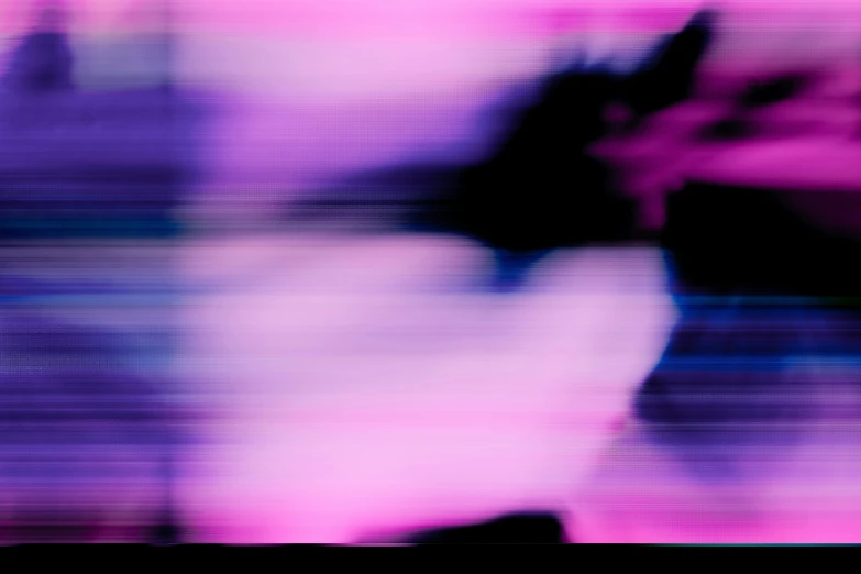 abstract blurry pograph with a person standing in the background