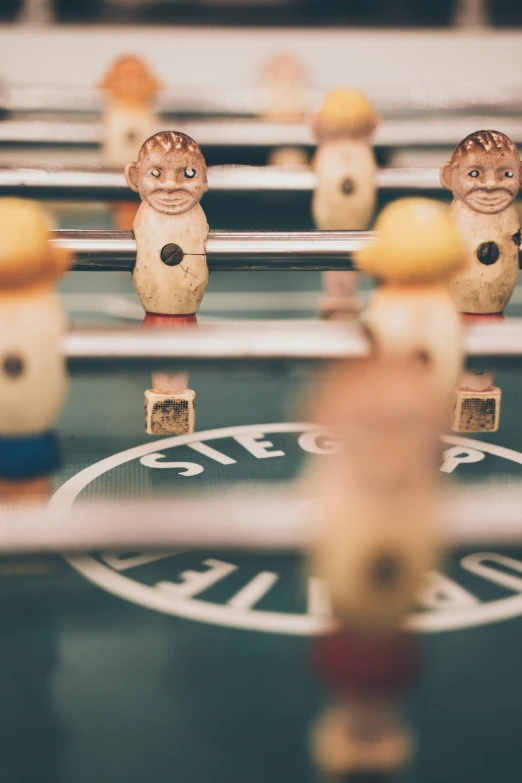 a foo foo game table filled with small figurines