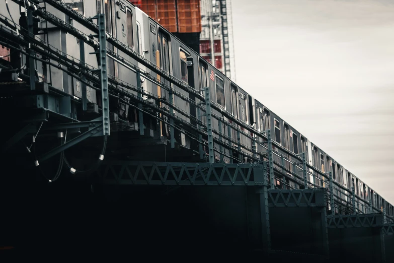 a train goes over a bridge over water