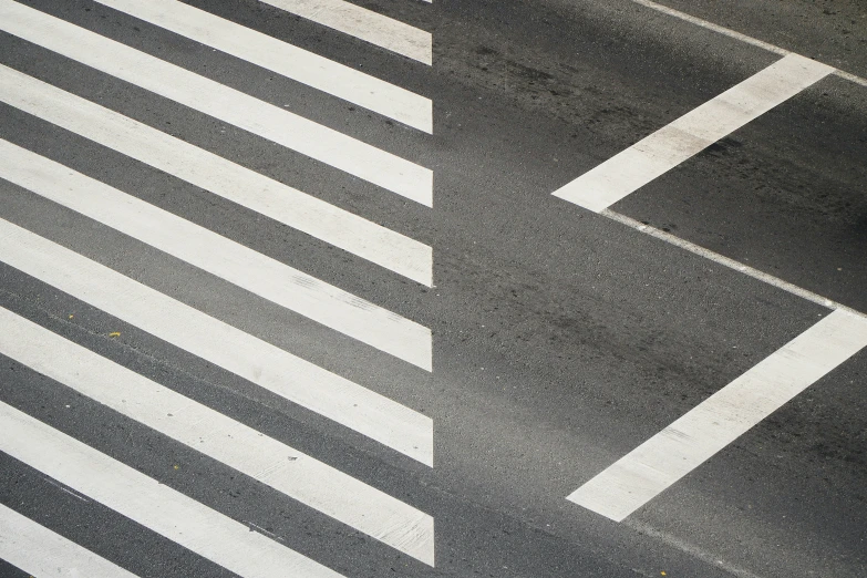an overhead view of the intersection in a street