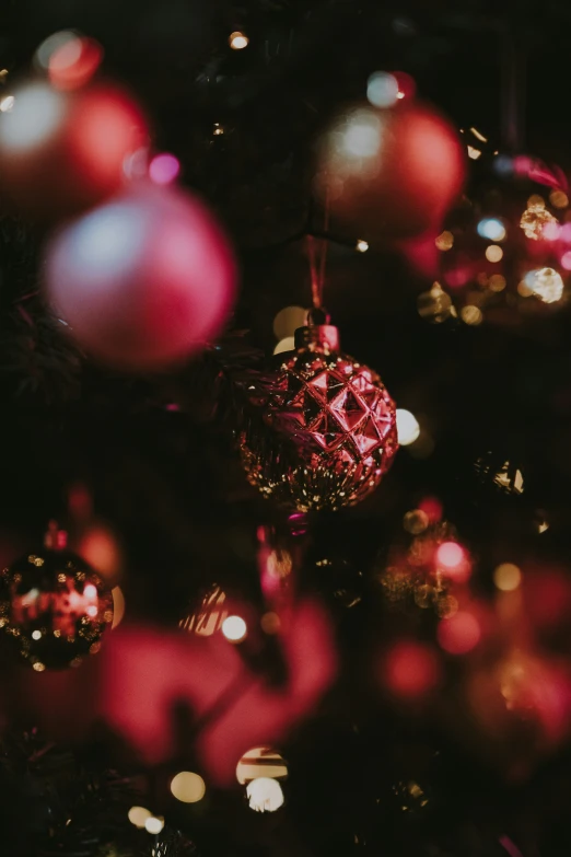 ornaments with pink and red ornaments all around them