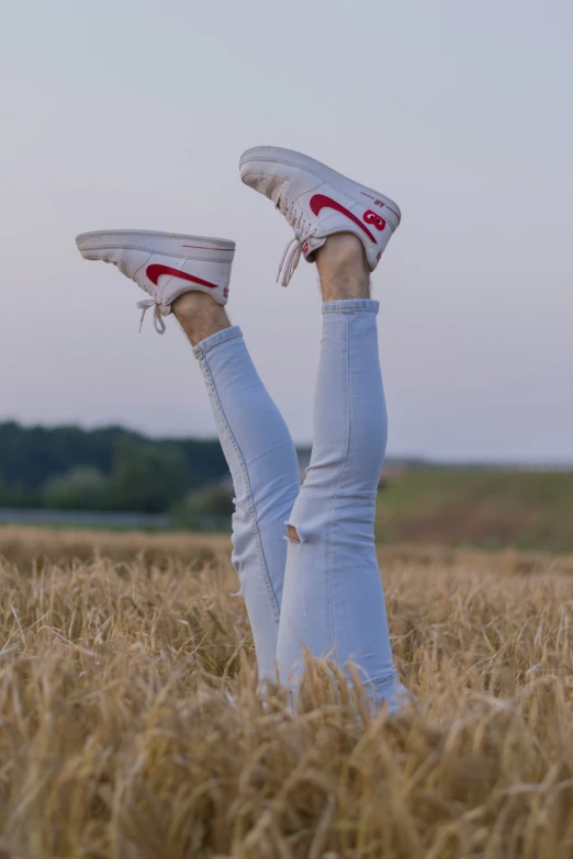 a woman's  in a wheat field