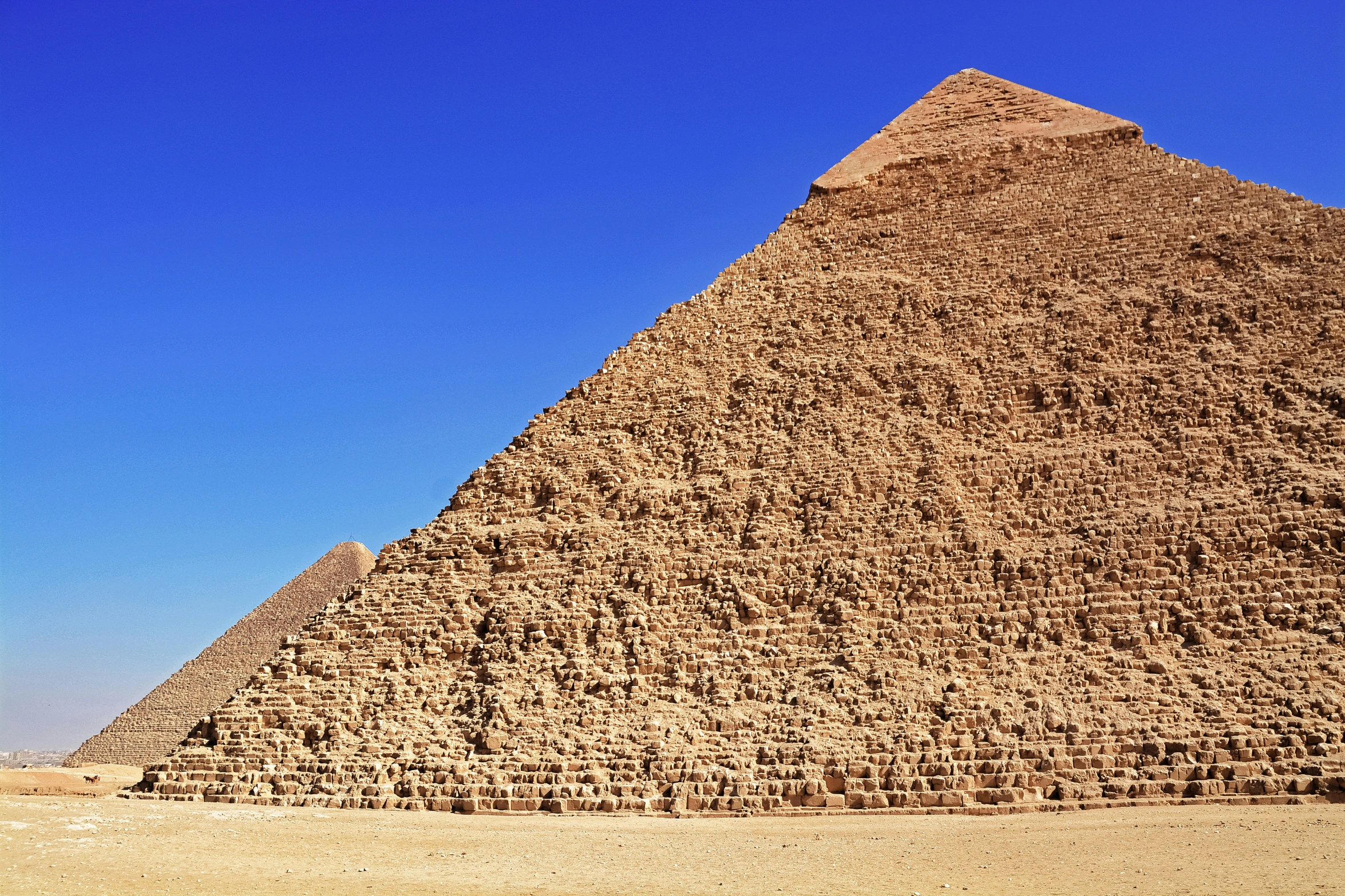 the great pyramid of giza with the sky in the background