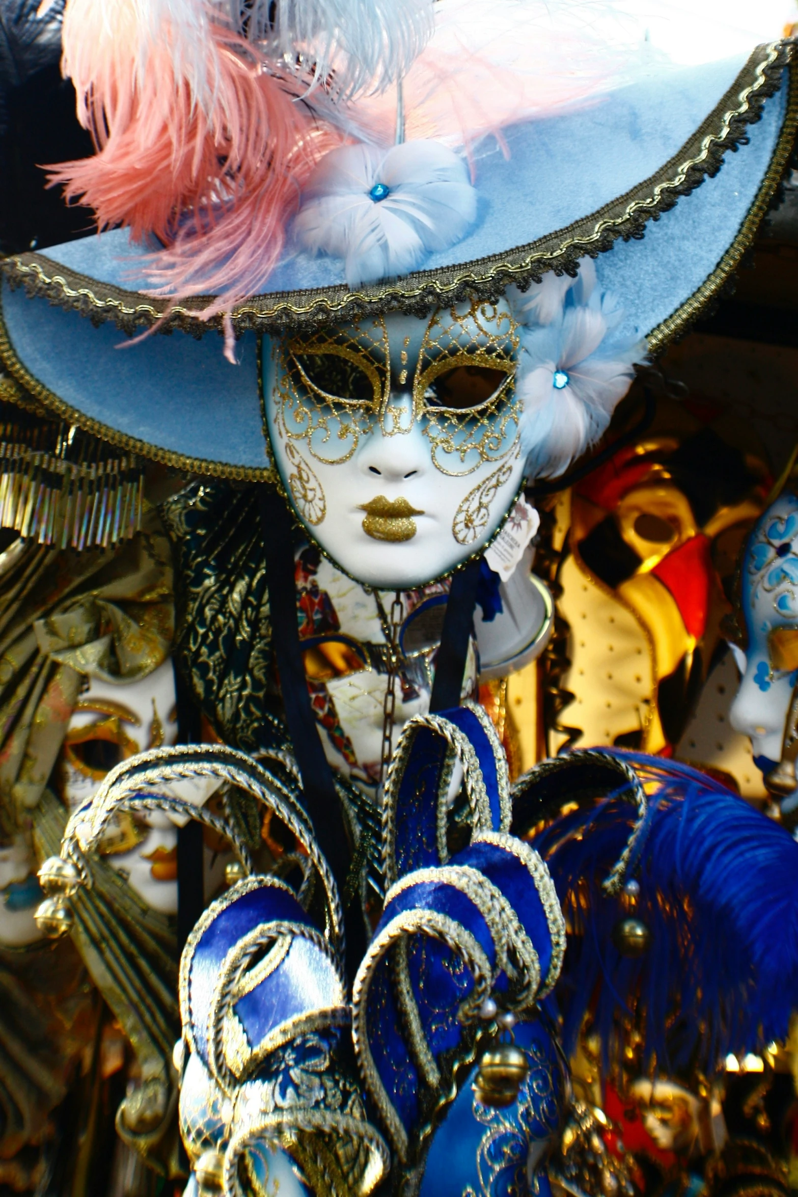 a man wearing a costume and headpiece in a store