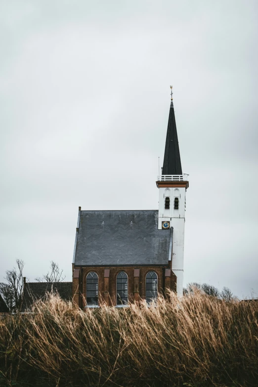 there is a very small church in the field