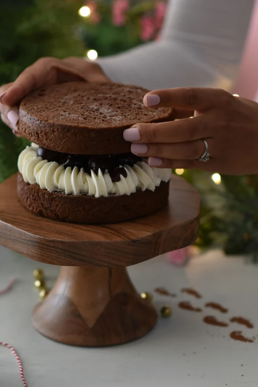 a person holds onto some cookies on a platter